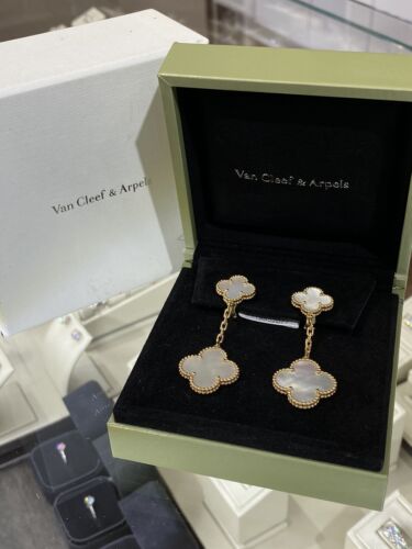 Magic Alhambra earrings 18K yellow gold, Mother-of-pearl - Van Cleef &  Arpels